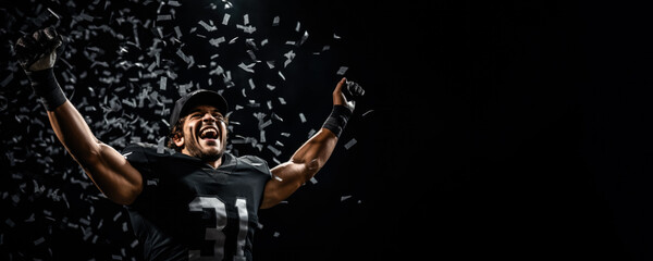 Fototapeta na wymiar American football player celebrating a championship win on black background with empty space for text 
