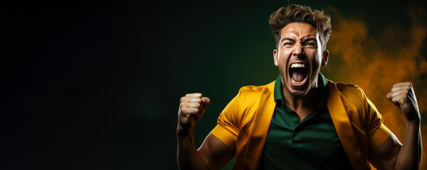 Australian football fan celebrating a victory on green and gold background with empty space for text 