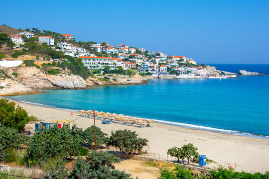 LAerial drone photo of famous wavy beach of Mesakti ideal for wind surfing in island of Ikaria, Aegean, Greece