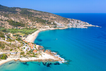 Fototapeta premium LAerial drone photo of famous wavy beach of Mesakti ideal for wind surfing in island of Ikaria, Aegean, Greece