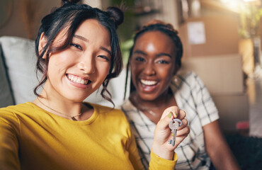 Couple of friends, keys and new home selfie for moving in together for real estate investment. Rent, mortgage and loan of women with smile for social media portrait at apartment or house with partner
