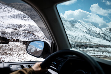 Driving car on the high altidue road, China © lzf