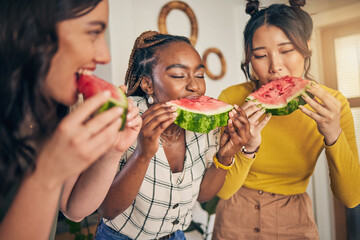 Women, friends and eating watermelon in home for bonding, nutrition and happy lunch together. Healthy diet fruit, sharing and wellness, fresh summer food for friendship and girls in kitchen at party.