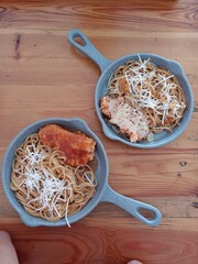 delicious spaghetti served in industrial pan