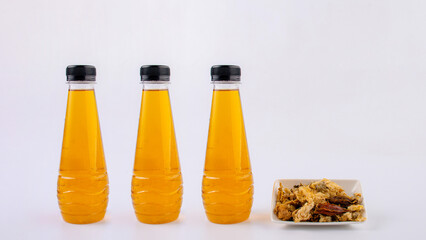 Cold water of chrysanthemum flowers and dried chrysanthemum flowers on white background.