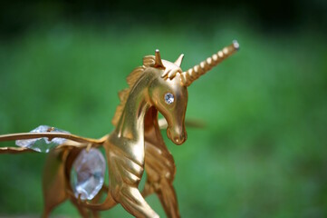A metal unicorn figurine. Esotericism and feng shui. Talismans and amulets.