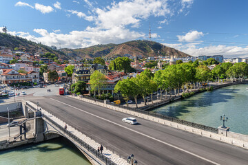 Fototapeta na wymiar The Metekhi Bridge over the Kura (Mtkvari) River, Tbilisi