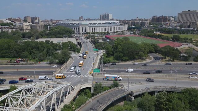 another aerial shot of Yankee Stadium pulling back along Macombs Dam Bridge