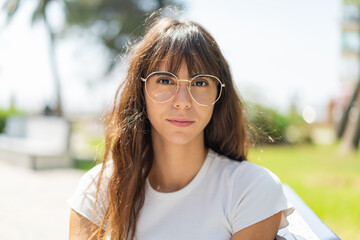 Young woman at outdoors With glasses