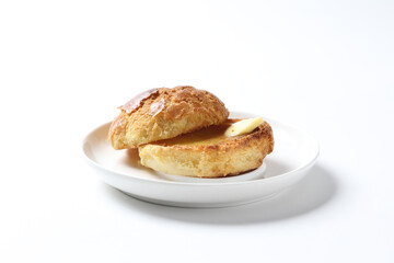 Hong Kong crispy skin polo bun toast with butter and honey jam breakfast in plate on white background western chef appetiser halal bakery food restaurant pastry menu for cafe