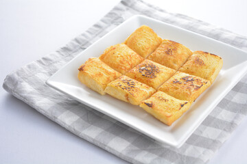 square fried egg French toast bread set with half boiled soft chicken egg and hot coffee or tea breakfast on white background asian chef appetiser halal bakery food restaurant pastry menu for cafe
