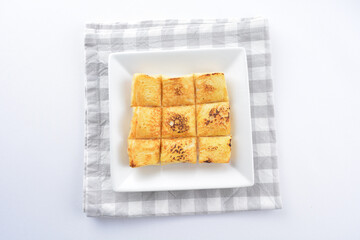 square fried egg French toast bread set with half boiled soft chicken egg and hot coffee or tea breakfast on white background asian chef appetiser halal bakery food restaurant pastry menu for cafe