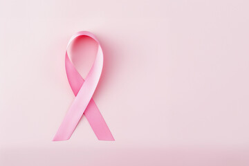 International symbol of Breast Cancer Awareness Month in October with pink ribbon copy space. 