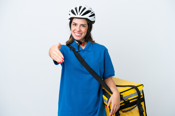 Young delivery woman with thermal backpack isolated on white background shaking hands for closing a good deal