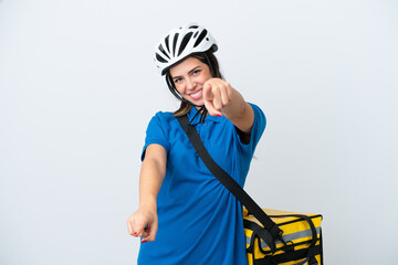 Young delivery woman with thermal backpack isolated on white background points finger at you while smiling
