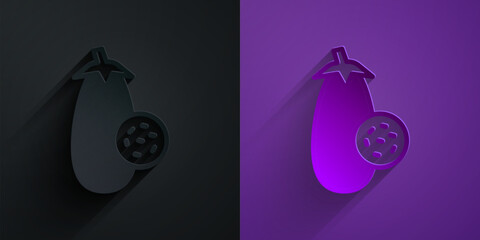 Paper cut Eggplant icon isolated on black on purple background. Paper art style. Vector