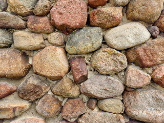 Fototapeta na wymiar texture of the stone wall. Stone wall as background or texture