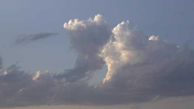 wind drives evening clouds over the horizon.