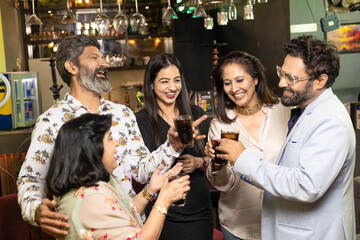 Indian people enjoying party at restaurant