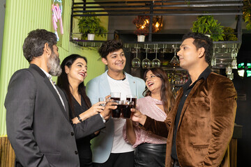 Indian people enjoying party at restaurant.