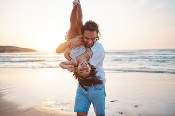 Beach, sunset and father play with girl on holiday, vacation and adventure. Happy family, adoption and child laughing with dad by ocean for bonding, healthy relationship and fun outdoors in summer