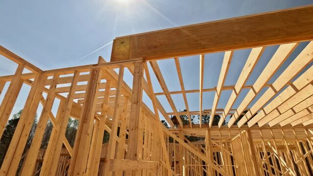 New house being built requires incorporation wooden beams as inside frame support