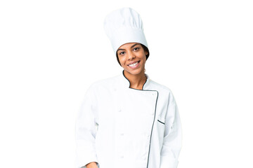 Young African American chef over isolated chroma key background laughing