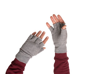 two hands in gray gloves without fingers