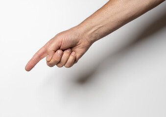 a male hand pointing with a finger