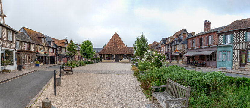 Street with historical half-timbered houses in Beuvron-en-Auge, Normandy France