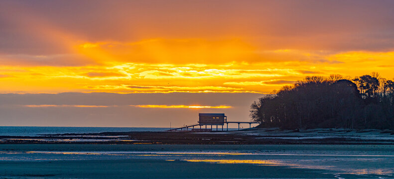 Sunset over a pier.