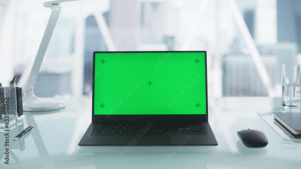 Wall mural laptop computer with mock up green screen with chromakey display with motion trackers standing on a 