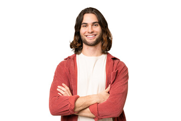 Young handsome man over isolated background keeping the arms crossed in frontal position