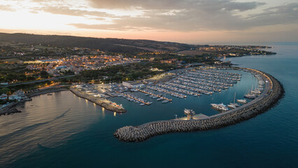 Boats and sailboats moored at the small port of Civitavecchia Italy. Aerial view of the Tyrrhenian...
