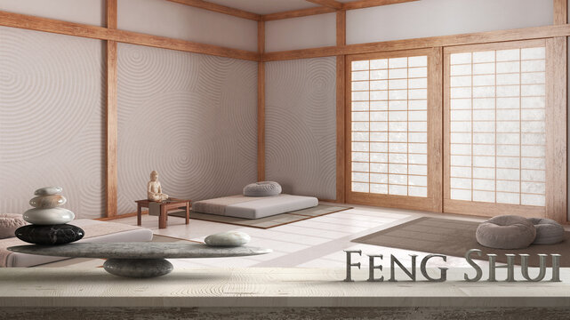 Wooden vintage table shelf with stone balance and 3d letters making the word feng shui over minimal meditation room in japanese style, zen concept interior design