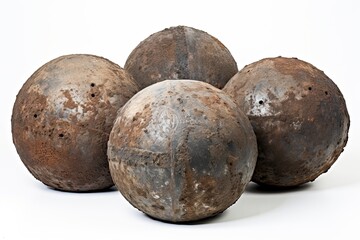 Fototapeta premium Rustic cannonballs against white background. Generative AI