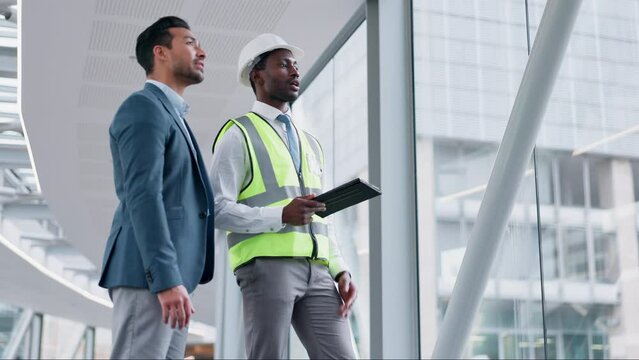 Tablet, collaboration or construction with an engineer and architect in a building for planning a development project. Technology, vision or teamwork with a manager and designer talking maintenance