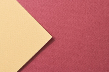 Rough kraft paper background, paper texture red burgundy yellow colors. Mockup with copy space for text.