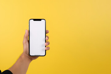 Fototapeta na wymiar Smartphone white screen mockup in human hand