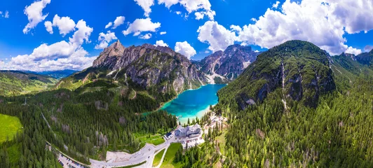 Foto op Canvas south Tyrol, Italy .  One of the most beautiful mountain Alpine lakes - magic Lago di Braies, sorrounded by Dolomites mountains. aerial drone panoramic view. © Freesurf