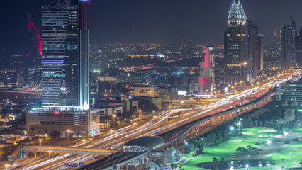 Fototapeta na wymiar Aerial view of Sheikh Zayed Road in Dubai Internet City area day to night timelapse