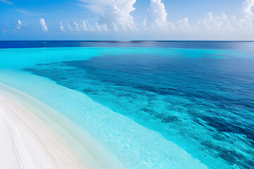 White sand beach and blue transparent ocean. Beautiful Azure Seaside.
