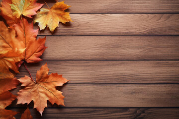 Naklejka na ściany i meble Autumn leaves on wooden background - nagative space for designers