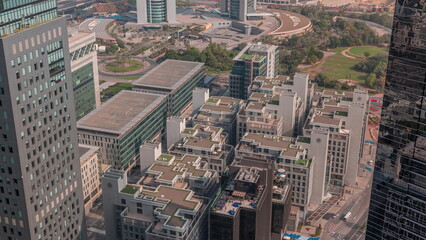 Hotels and office buildings in financial district in Dubai aerial timelapse