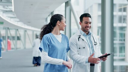 People, doctor and tablet walking in healthcare, discussion or planning together at the hospital. Man and woman medical professional with technology for health service, results or teamwork at clinic