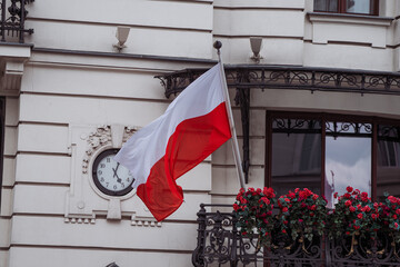 Polish flag on flowery balcony