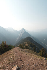 Views of mountains and forests on a summers day in Kananaskis Country, Alberta, Canada from on top of King Creek Ridge