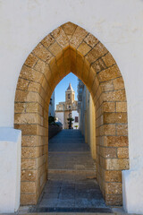 Church of Nuestra Señora de la O from stone arch door, in Rota, Cadiz, Andalusia