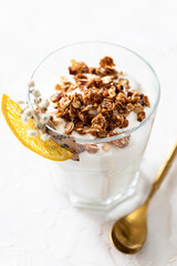 Natural yogurt with homemade granola, dessert in a glass