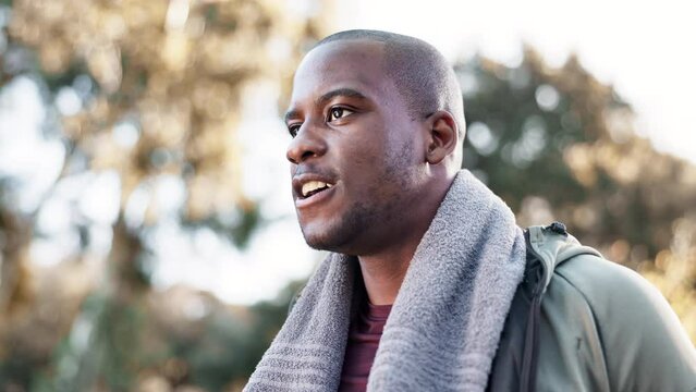 Outdoor, exercise and black man drinking water in cardio workout to relax or run in the park, woods and wellness in nature. Liquid, bottle and hydrate in break from training, fitness or sports